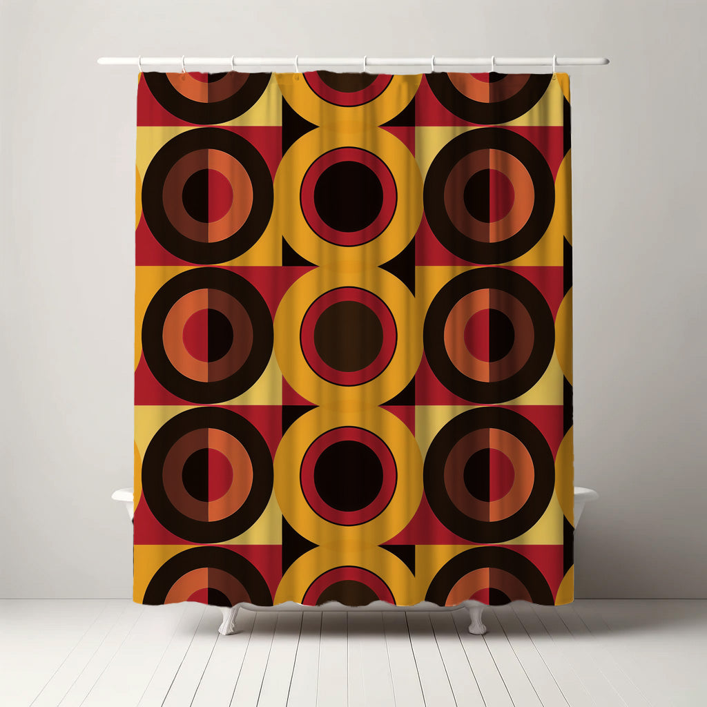 Retro-styled shower curtain with a vibrant pattern of black, gold, and burnt orange rings and discs, capturing the funky spirit of the 60s for a stylish bathroom.